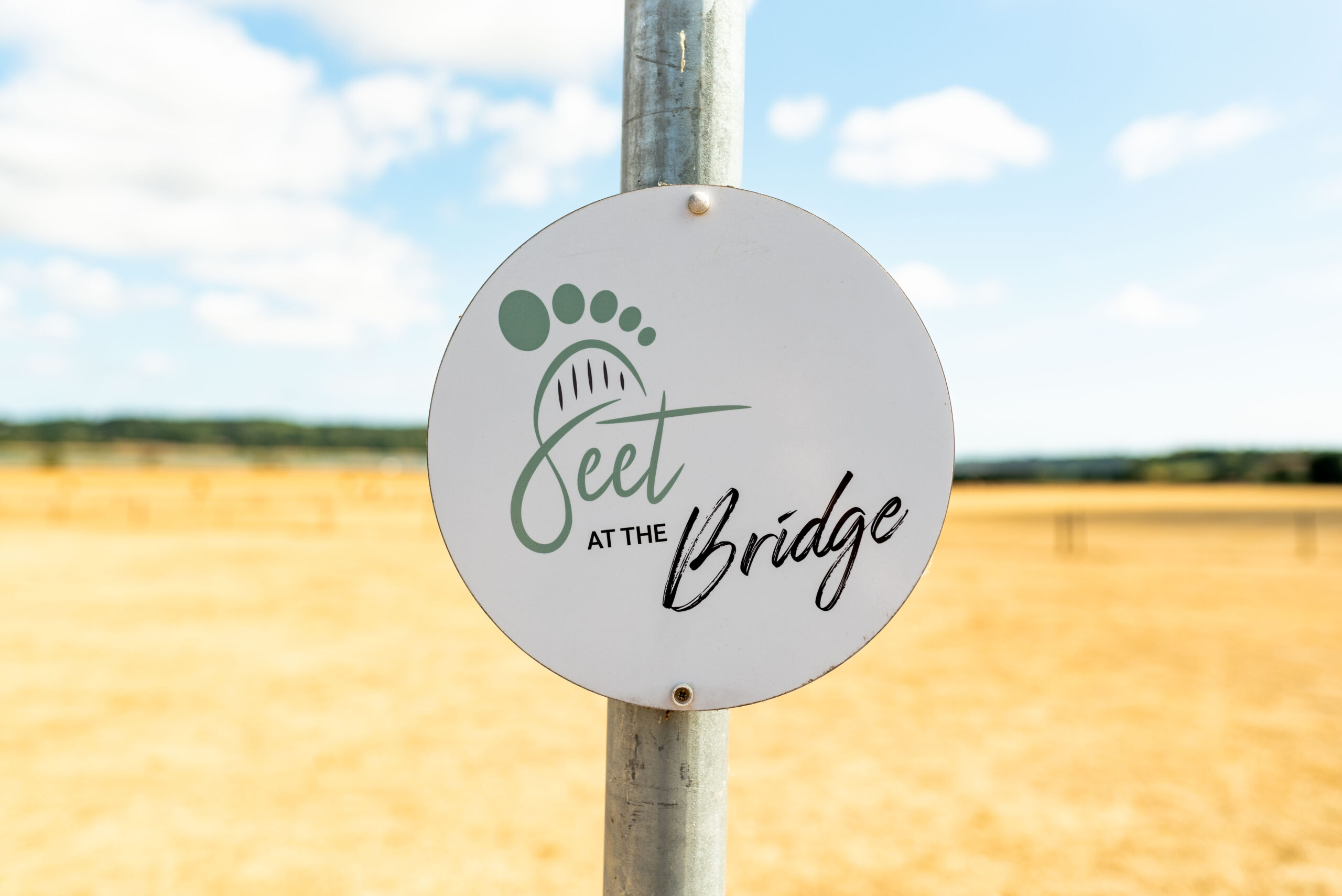 Feet at the Bridge Logo Sign Feet at the Bridge Logo Sign